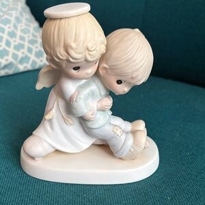 He Upholdeth Those Who Call Precious Moments figurine E-0526